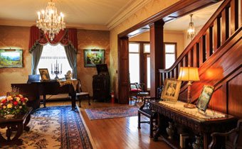 The sitting room and staircase of the Frank Phillips Home