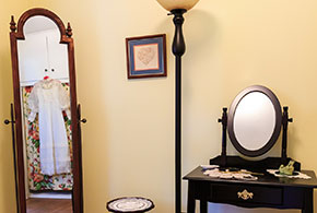 The dressing room of the bridal suite has everything you need to get ready for your big day, including a vanity and a full length mirror